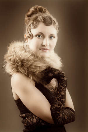 Woman retro revival portrait.girl in boa
