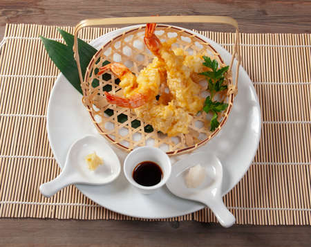 Japanese fried tempura with shrimp  in braided basketの写真素材
