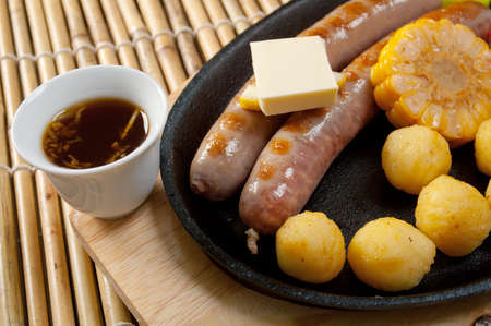 Japanese cuisine .Sausage making roasted with vegetableの写真素材