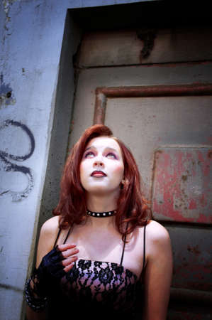 emo girl with beautiful hair on  Grunge background 