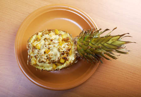 roast meat with cheese  grilled  in pineapple .closeupの写真素材