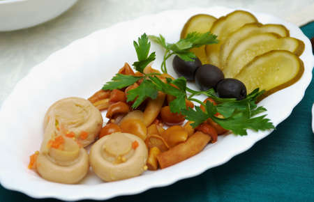 Snacks of vodka.mushrooms and marinated picklesの写真素材