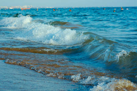 Beach with waves at the Mediterranean Resort Antalya Turkey