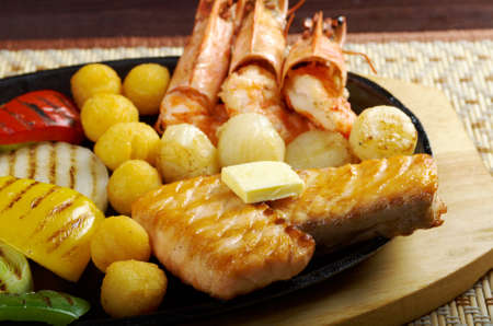 Japanese cuisine .Salmon Steak with royal prawn