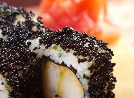 Japanese sushi  traditional japanese food.Roll made of Smoked fish and black roeの写真素材