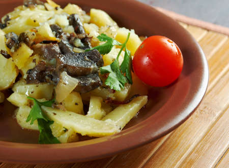 mushrooms with roasted potato closeupの写真素材