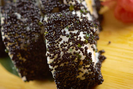 Japanese sushi  traditional japanese food.Roll made of Smoked fish and black roeの写真素材