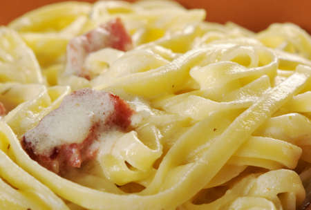 pasta Fettuccine Alfredo with sausage. close-upの写真素材