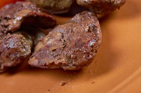 Chicken livers and vegetable closeupの写真素材