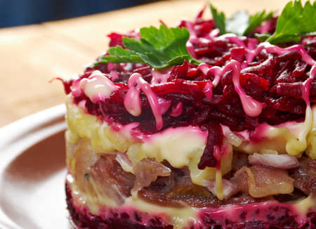 traditional russian salad with salted herring and beet -Selyodka Pod Shuboy (Dressed Herring)の写真素材