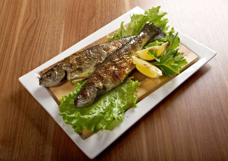 Two grilled Rainbow Trouts.Served with Vegetables