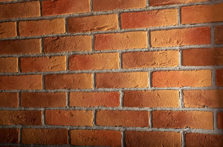 Background of brick wall texture.Weathered stainedの写真素材