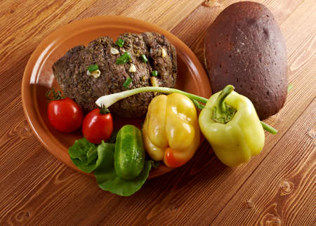 roast beef farm-style with vegetable and bread .farmhouse kitchenの写真素材