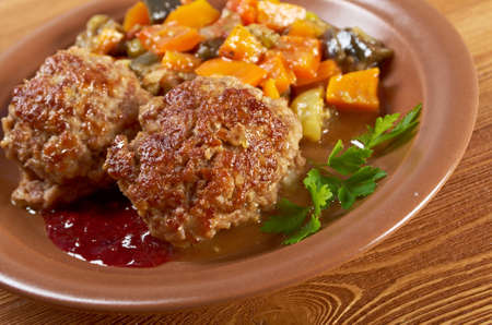 roasted meatballs beef with vegetables on a plateの写真素材