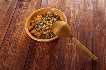 Belorussian Buckwheat porridge  vegetables und with pork .closeup