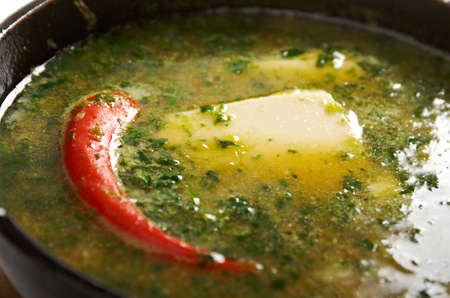 spinach soup with tofu and pepper chile .Japanese cuisineの写真素材