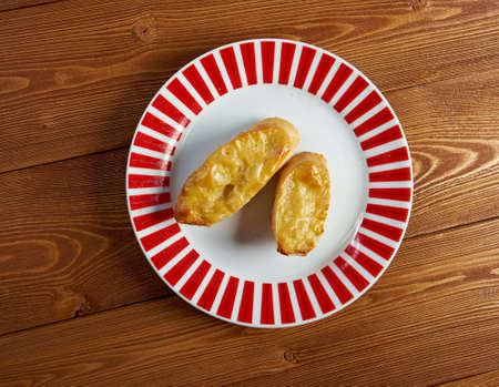 Welsh Rarebit - Toasted  bread with melted cheddar cheese
の写真素材