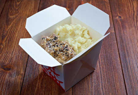 Beef slice  and potato.chinese cuisine in take-out boxの写真素材
