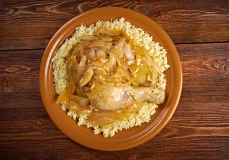 Roasted chickens Yassa is a spicy marinated food prepared with poultry.Originally from Senegal.の写真素材