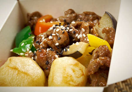 take-out food -Beef slice  and potato.chinese cuisine in take-out boxの写真素材