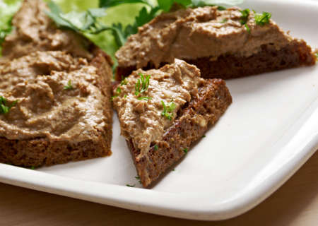 Slices of toasted bread with delicious liver pate