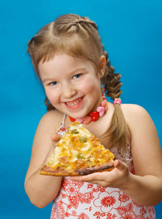 little girl eating pizzaの写真素材