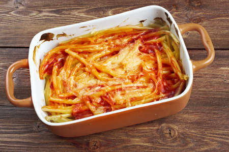 Macaroni with cheese and tomatoの写真素材