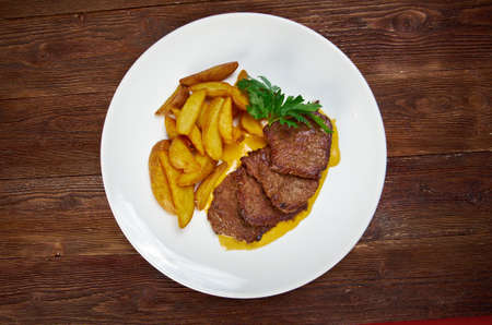Roast fillet beef with potatoes. Shallow depth-of-fieldの写真素材