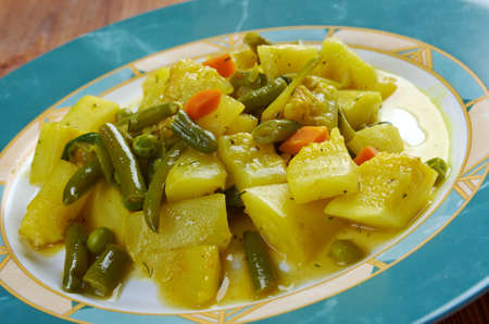 zucchine in umido con uova - Italian cuisine steamed zucchini with spicesの写真素材