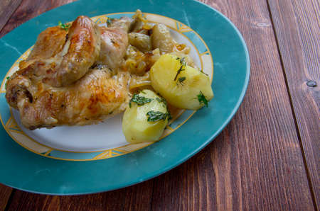 Poulet aux oignons - French roasted chicken  onion gravy. farm-styleの写真素材