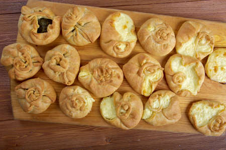 Russian pies with cheese and herbs