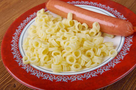 Ditalini  pasta with sausage served in a ceramic bowlの写真素材