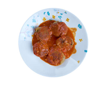 Boulettes de poisson Moroccan cuisine - fishballs in  tomato sauceの写真素材