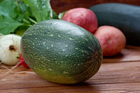 Fresh ingredients for cooking in rustic setting.の写真素材