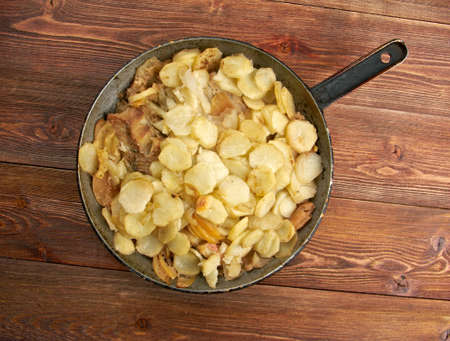 Baked red grouper with potato and  appleの写真素材