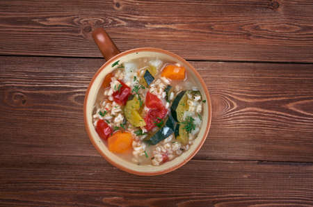 Zuppa dâorzo - barley soup with vegetables, traditional italian dishの写真素材