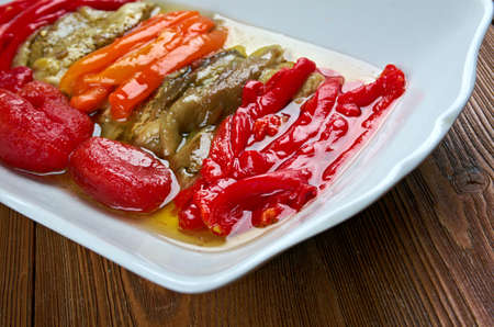 Escalivada - traditional Catalan dish of smoky grilled vegetables of roasted eggplant and bell peppers with olive oilの写真素材