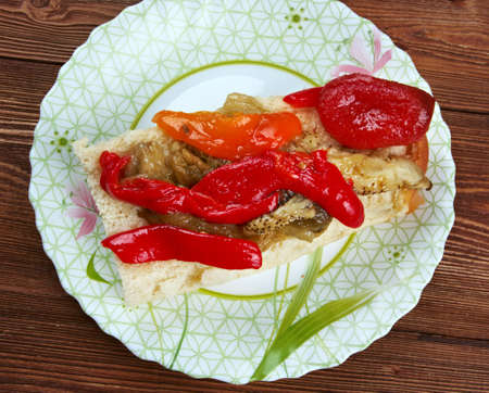 Escalivada - traditional Catalan dish of smoky grilled vegetables of roasted eggplant and bell peppers with olive oilの写真素材