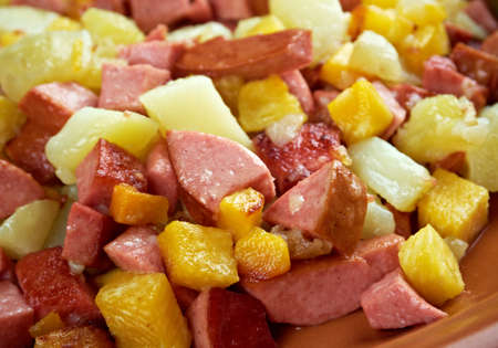 Pyttipanna -  term is Swedish for "small pieces in pan". It is a popular dish in Sweden, Norway and Finland, and in Denmark, where it bears the name biksemad, meaning food which has been mixed together.の写真素材