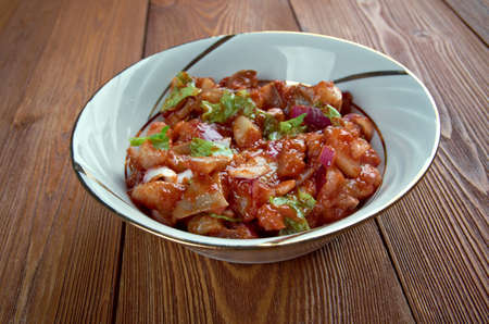 Tomatsild - Norwegian dish of pickled herring, onion and tomato paste