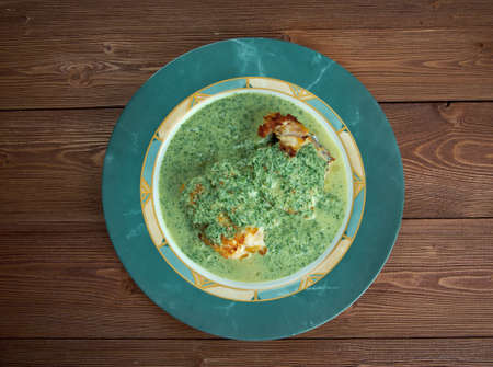 Merluza en salsa verde - fried fish with green sauce