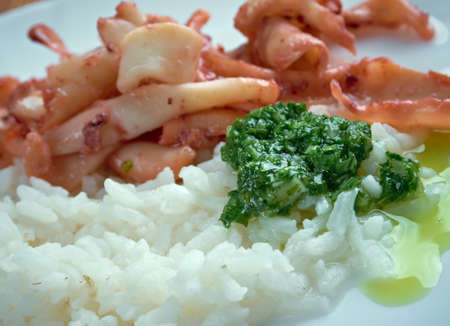 Arroz con calamares and Salsa Verde. peruvian foodの写真素材