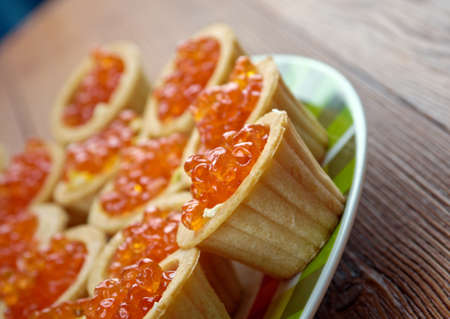 Tartlet with red caviar   . Shallow depth-of-fieldの写真素材
