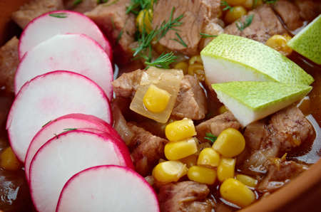 Pozole Ð Ð¾ÑÐ¾ - traditional soup Mexico.broth rich soup made with pork, red chiles, radishes, cilantroの写真素材