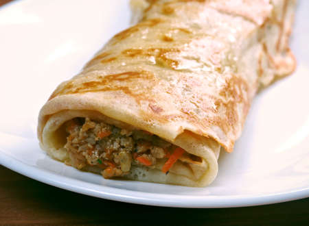 stuffed pancakes.stuffed with beef and vegetablesの写真素材