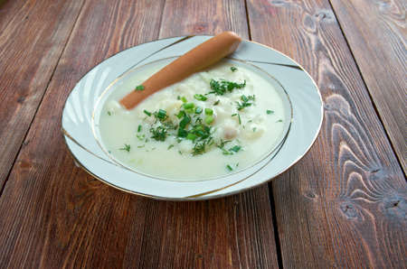 Sachsische Kartoffelsuppe  - potato soup with sausages. German and Austrian cuisineの写真素材