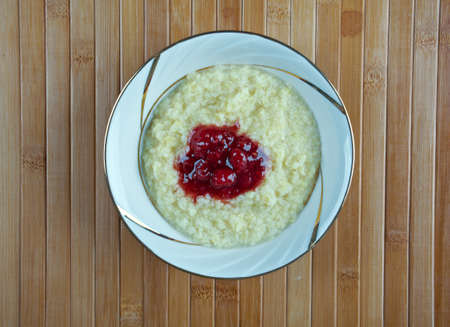 millet porridge with raspberry jam. close upの写真素材