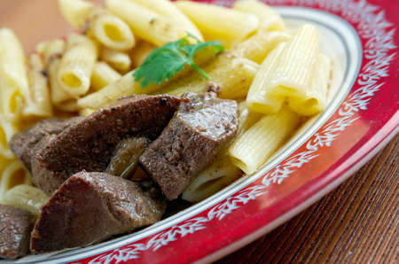 Delicious pasta with pork liver .Italian cuisineの写真素材