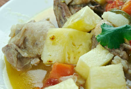 Pininyahang Manok  -  pineapple chicken cooked in coconut milk is the perfect Filipino dishの写真素材