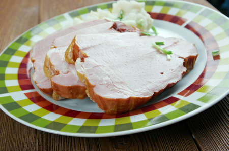 Kassler - German cuisine  salted  and slightly smoked cut of porkの写真素材